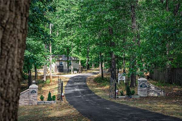 16.9 Acres of Land with Home for Sale in Rogers, Arkansas