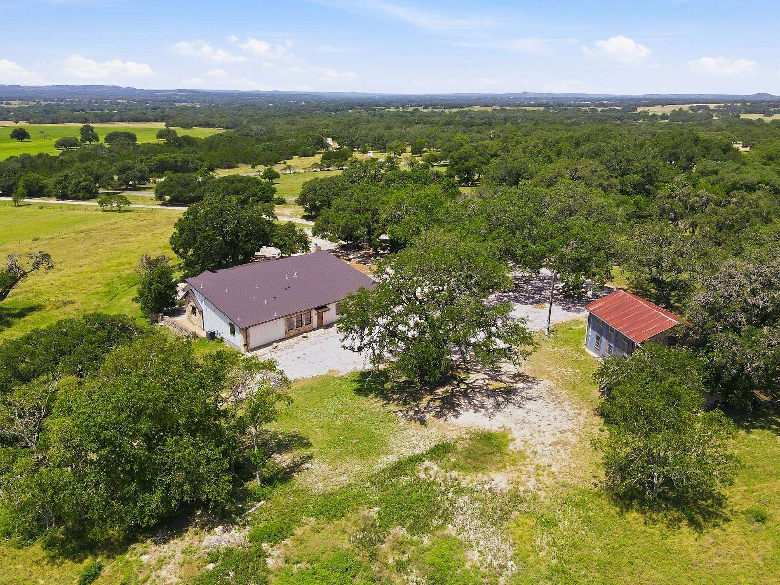 5.79 Acres of Land with Home for Sale in Blanco, Texas