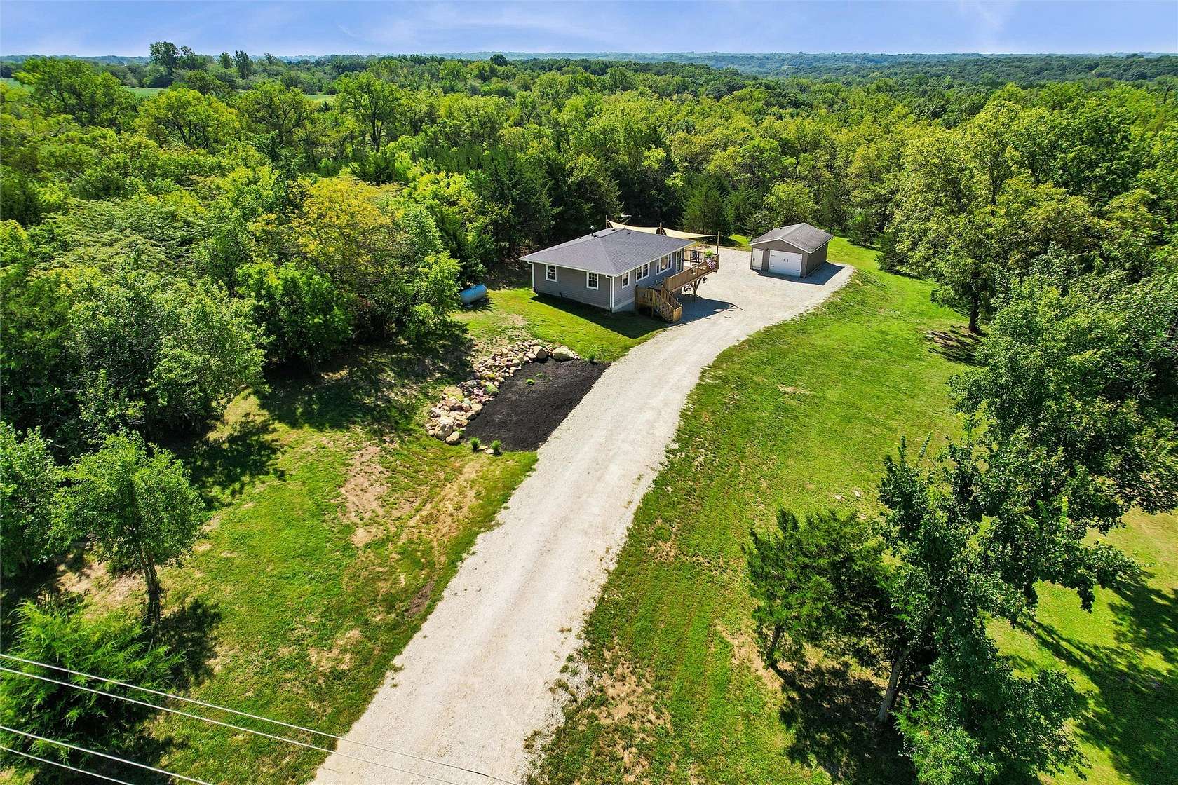 6.77 Acres of Land with Home for Sale in New Virginia, Iowa