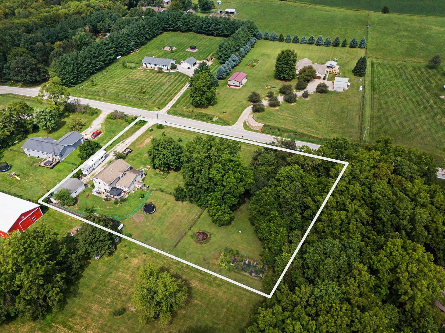 1.62 Acres of Land with Home for Sale in Mitchellville, Iowa