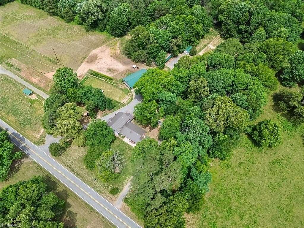 5.9 Acres of Land with Home for Sale in Hamptonville, North Carolina