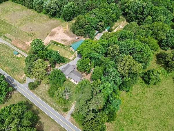5.9 Acres of Land with Home for Sale in Hamptonville, North Carolina