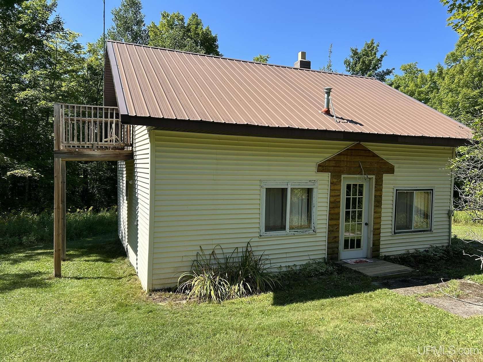 10 Acres of Recreational Land with Home for Sale in Skandia, Michigan