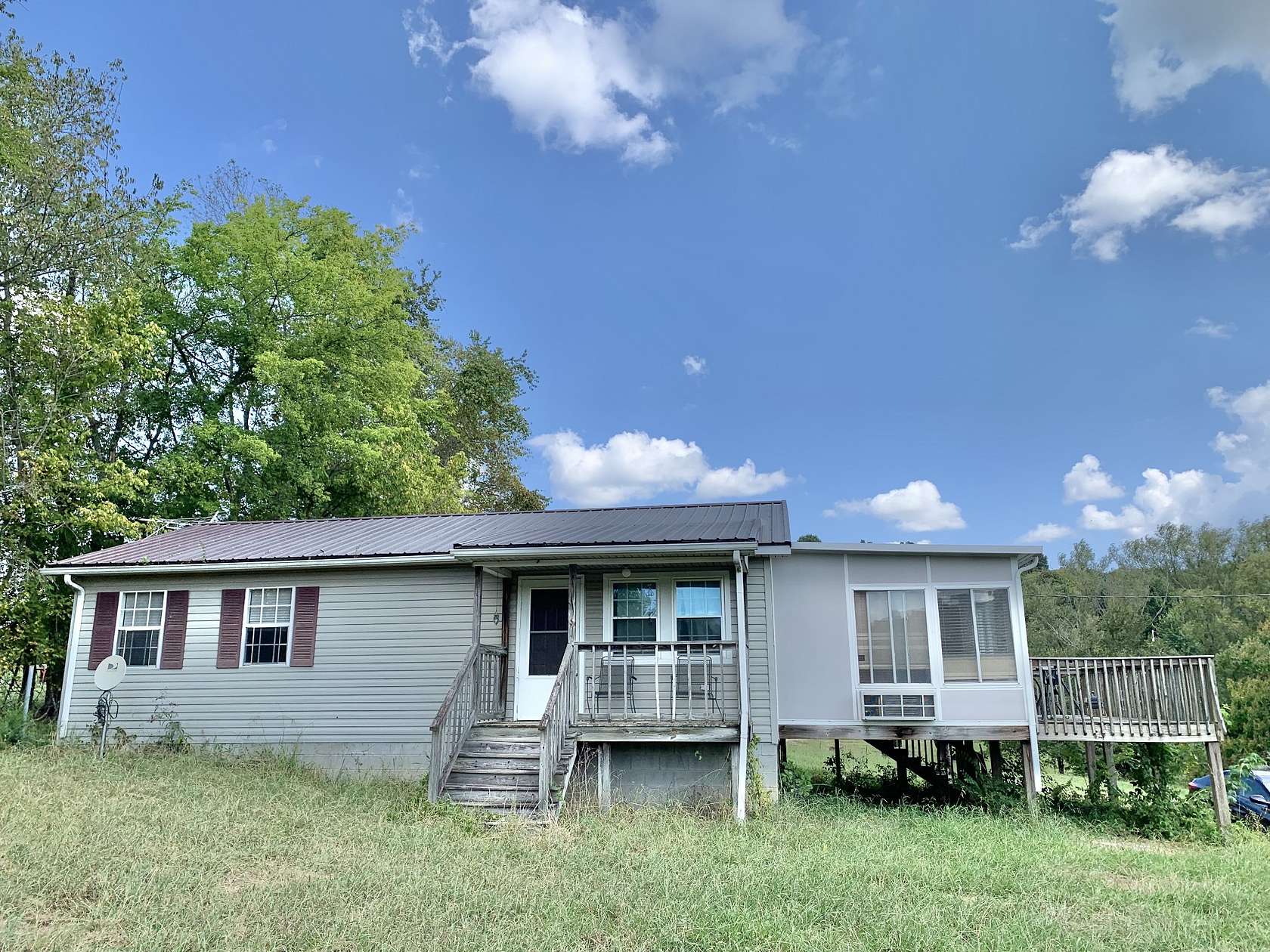 1.78 Acres of Land with Home for Sale in Brush Creek, Tennessee