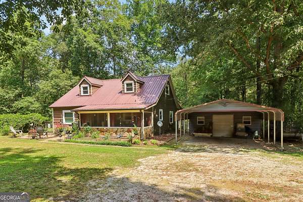 5.7 Acres of Land with Home for Sale in Covington, Georgia
