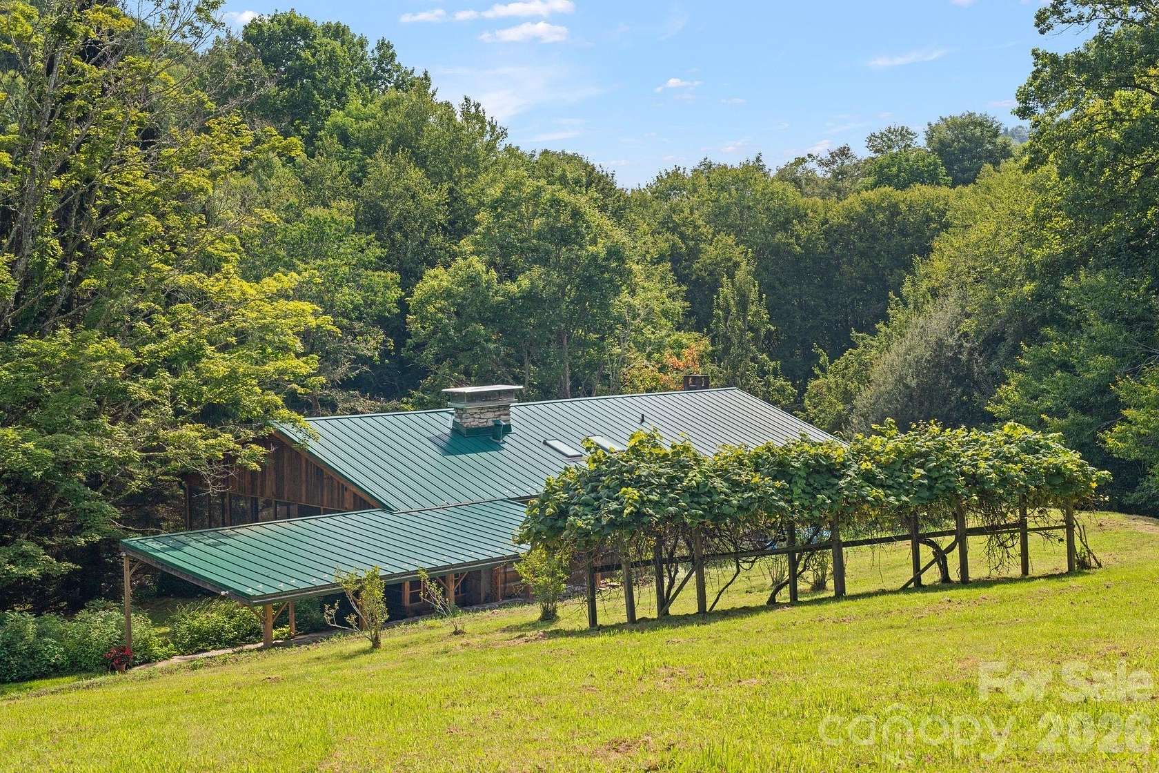35 Acres of Land with Home for Sale in Mars Hill, North Carolina