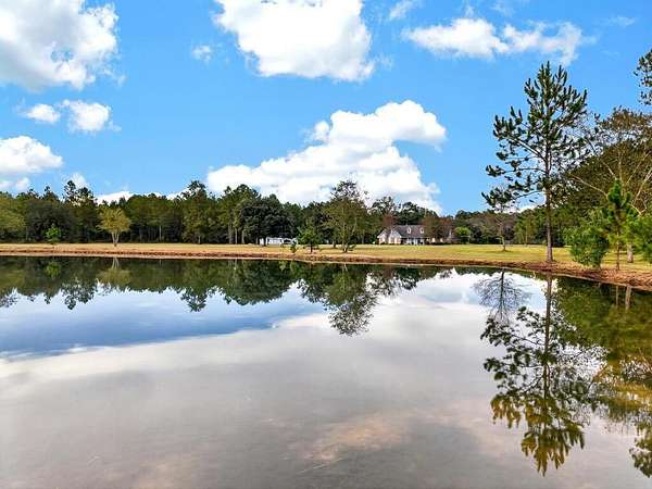 35.7 Acres of Agricultural Land with Home for Sale in Picayune, Mississippi