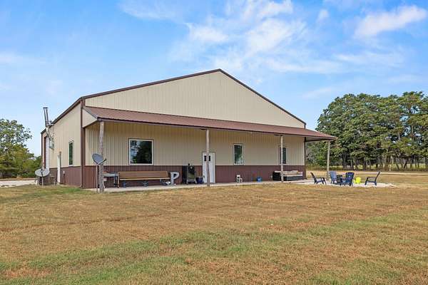 27.2 Acres of Agricultural Land with Home for Sale in Bolivar, Missouri