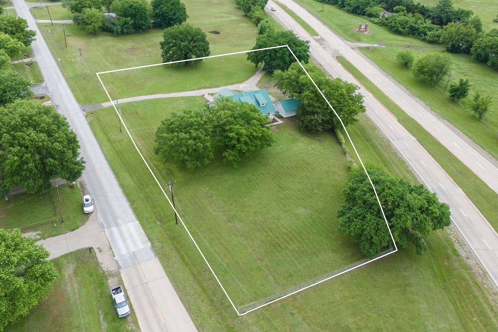 1.6 Acres of Land with Home for Sale in Coffeyville, Kansas