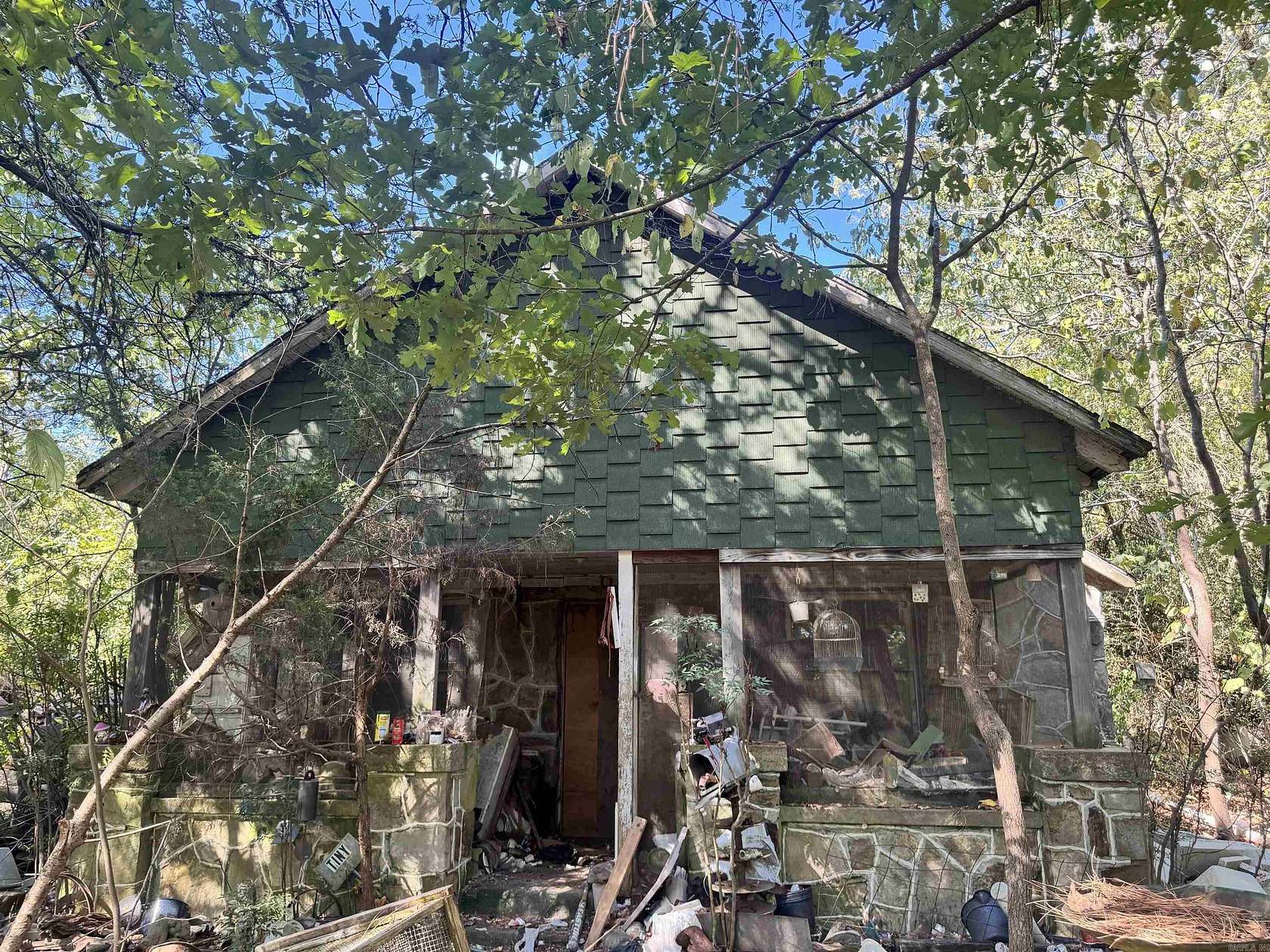 23.5 Acres of Land with Home for Sale in Mena, Arkansas