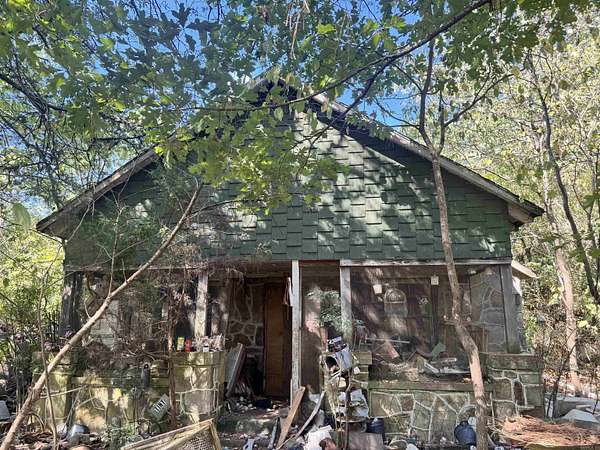 23.5 Acres of Land with Home for Sale in Mena, Arkansas