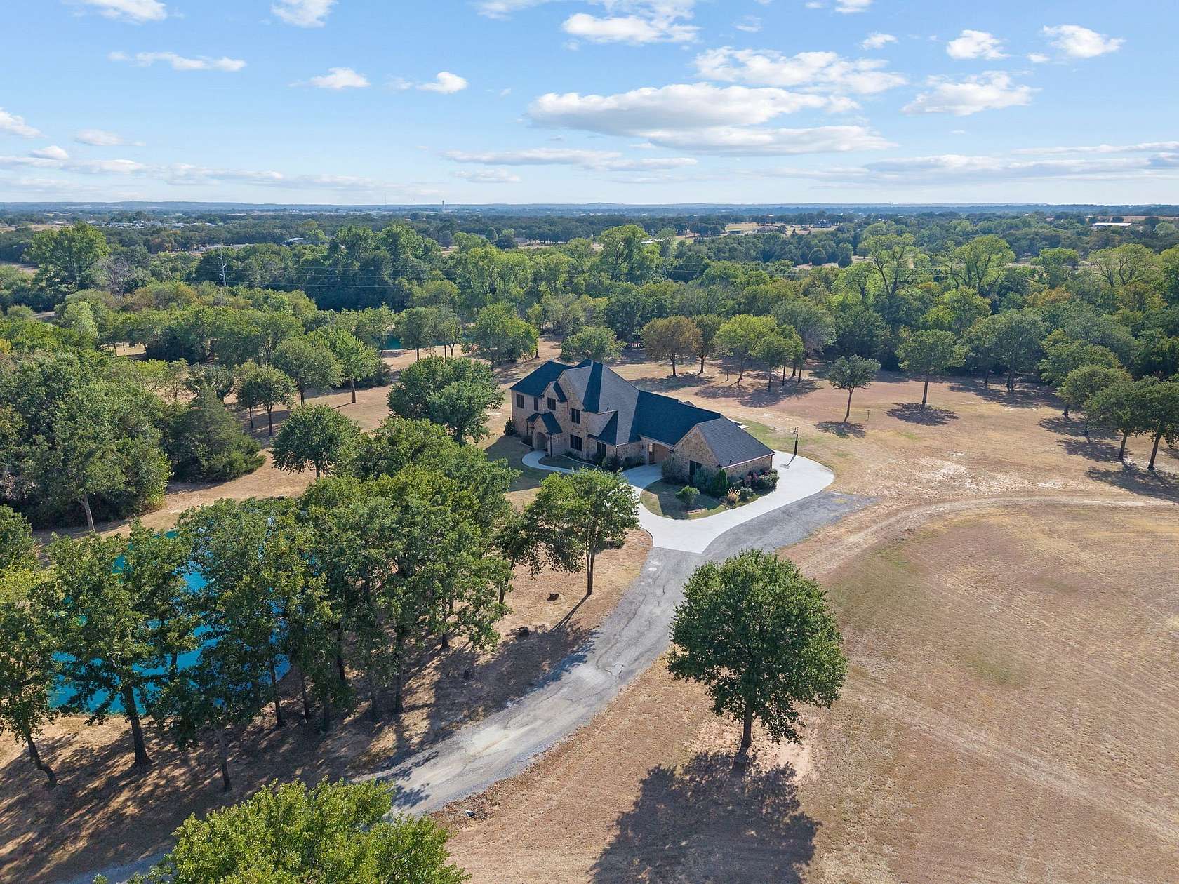 25.1 Acres of Recreational Land with Home for Sale in Springtown, Texas