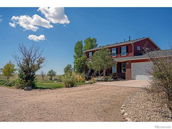 4.53 Acres of Land with Home for Sale in Briggsdale, Colorado