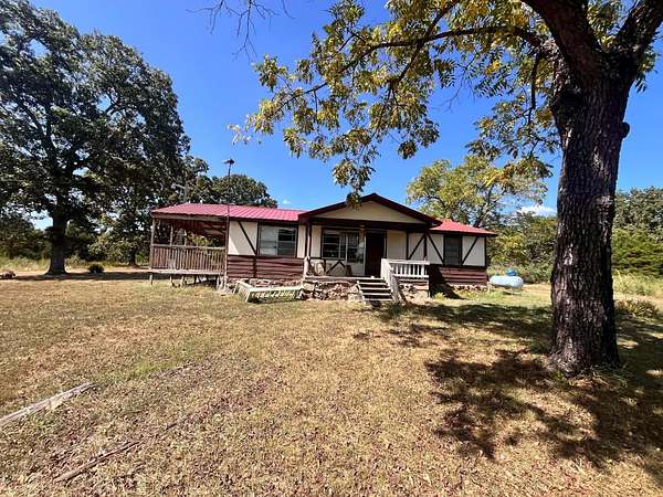 10 Acres of Land with Home for Sale in Mammoth Spring, Arkansas