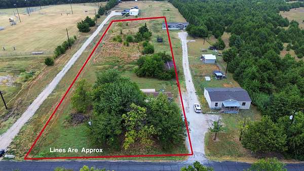 1.89 Acres of Land with Home for Sale in Farmersville, Texas