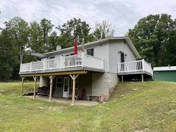80 Acres of Recreational Land with Home for Sale in Wellston, Michigan