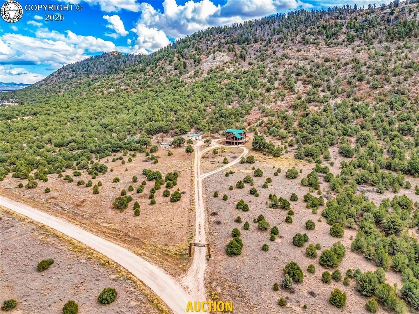 35.1 Acres of Land with Home for Auction in Westcliffe, Colorado