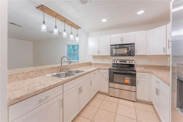 2.36 Acres of Land with Home for Sale in Inglis, Florida