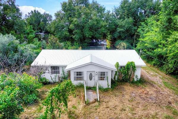 5 Acres of Land with Home for Sale in Avon Park, Florida