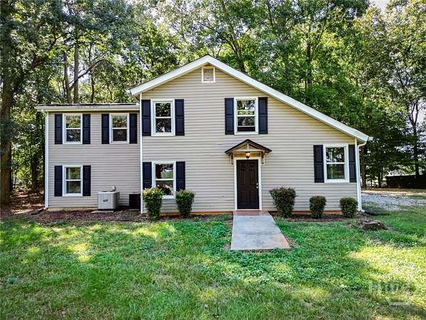 1.5 Acres of Land with Home for Sale in Commerce, Georgia