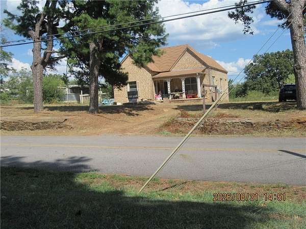 2.44 Acres of Land with Home for Sale in Altus, Arkansas