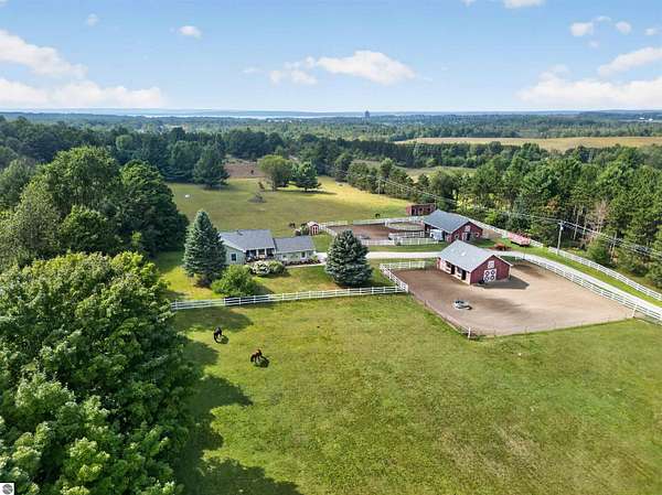 20 Acres of Agricultural Land with Home for Sale in Williamsburg, Michigan