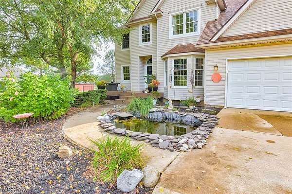 6.56 Acres of Land with Home for Sale in Louisville, Ohio