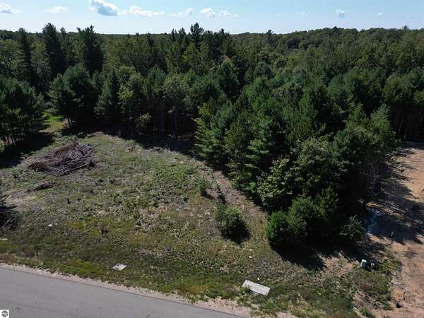0.8 Acres of Land for Sale in Grawn, Michigan