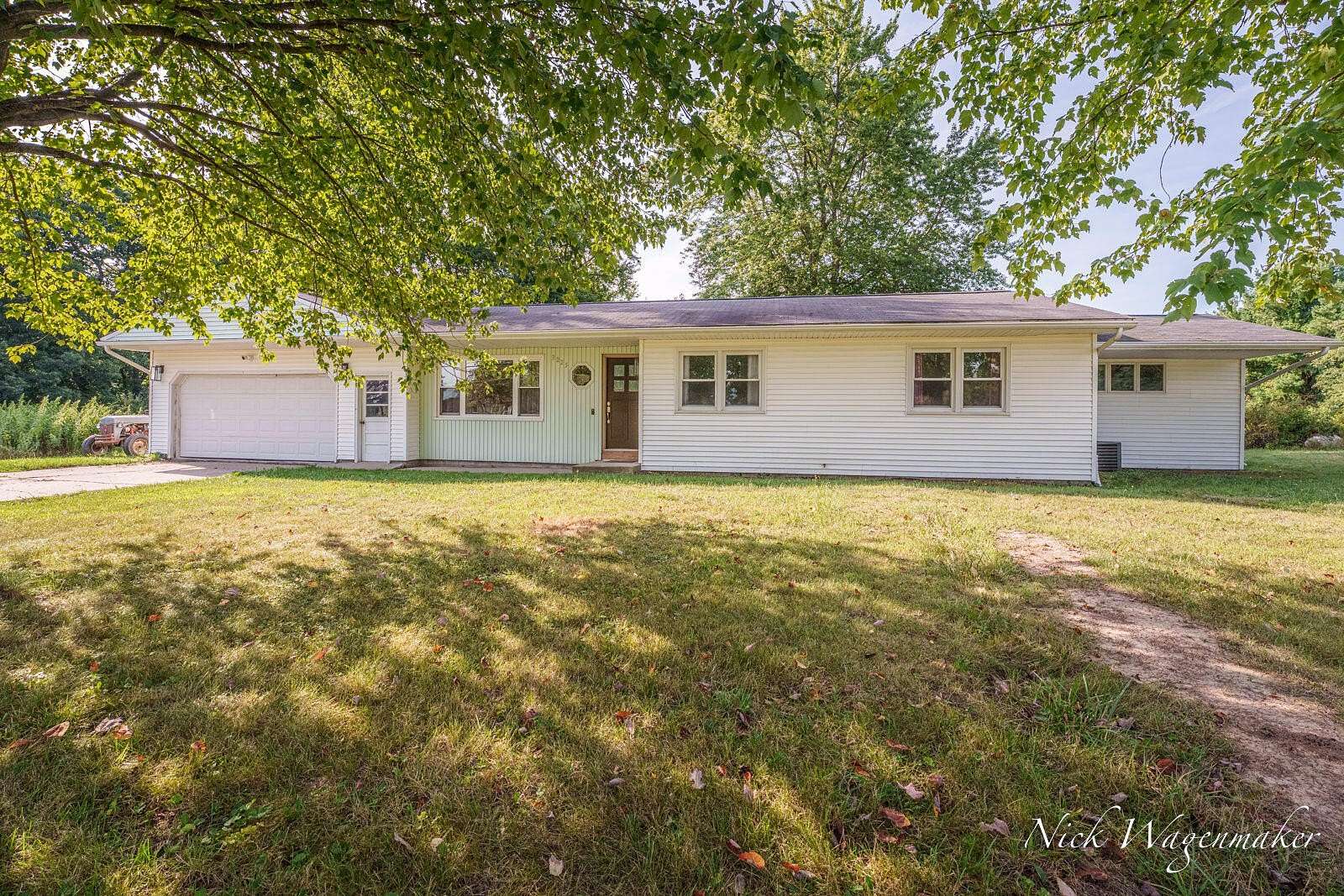 10 Acres of Land with Home for Sale in Whitehall, Michigan
