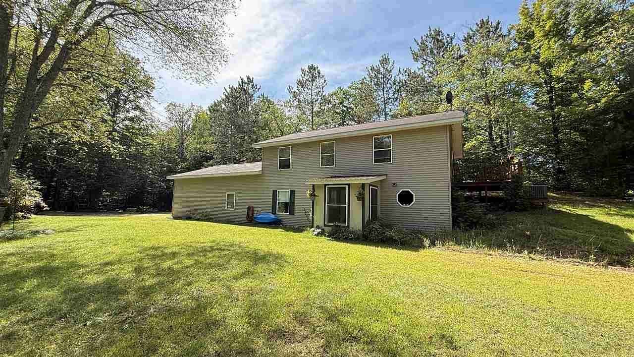 12.6 Acres of Recreational Land with Home for Sale in Central Lake, Michigan