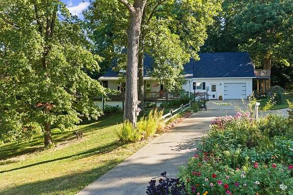 10.2 Acres of Land with Home for Sale in Reynolds Station, Kentucky