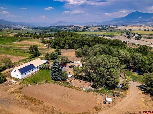 5.25 Acres of Land with Home for Sale in Hotchkiss, Colorado