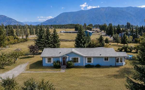 5 Acres of Land with Home for Sale in Columbia Falls, Montana
