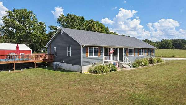 11.4 Acres of Land with Home for Sale in Stockton, Missouri