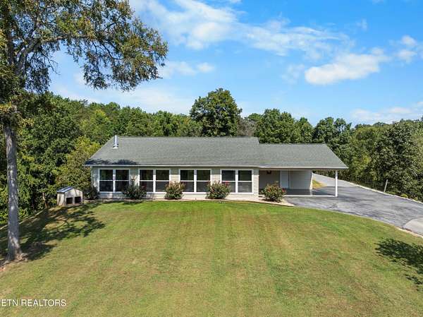 5.67 Acres of Land with Home for Sale in Sevierville, Tennessee