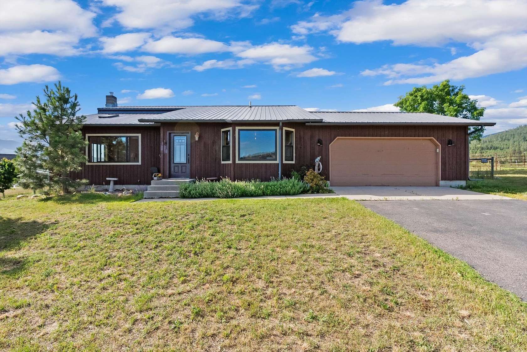 1.66 Acres of Land with Home for Sale in Lolo, Montana
