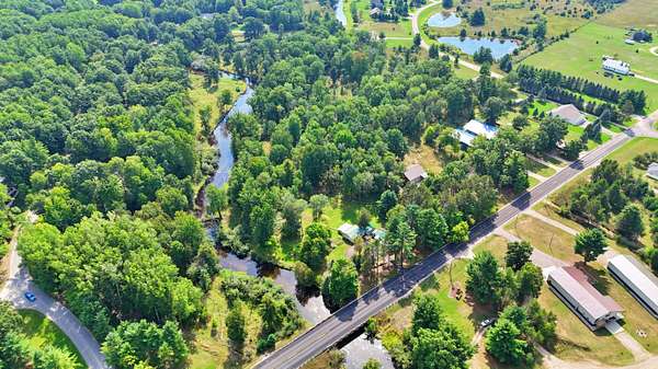 9.8 Acres of Land with Home for Sale in Stanwood, Michigan