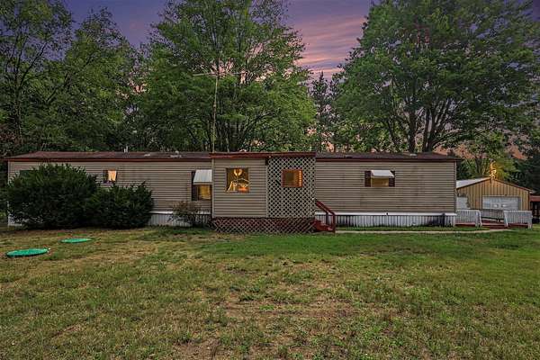 2.5 Acres of Land with Home for Sale in Ravenna, Michigan