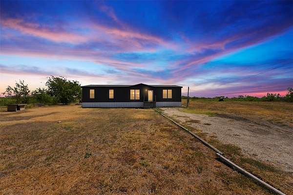 10 Acres of Land with Home for Sale in Powell, Texas