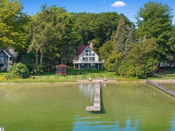 1.5 Acres of Land with Home for Sale in Honor, Michigan