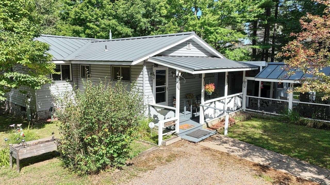 4.5 Acres of Land with Home for Sale in Lake Tomahawk, Wisconsin