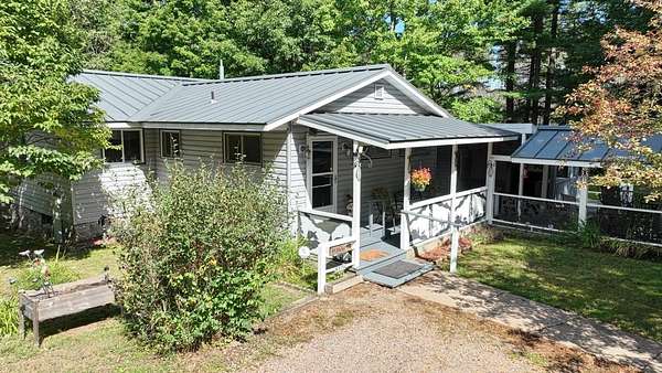 4.5 Acres of Land with Home for Sale in Lake Tomahawk, Wisconsin