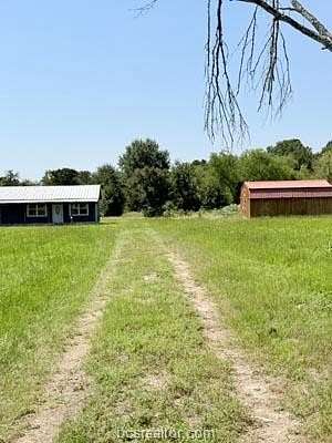3 Acres of Land with Home for Sale in Bedias, Texas