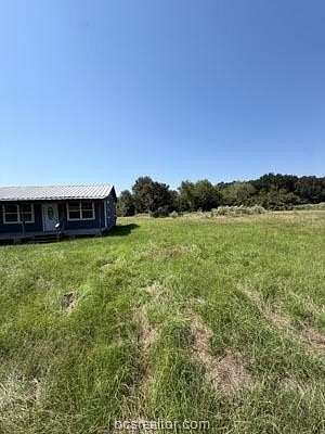 3 Acres of Land with Home for Sale in Bedias, Texas