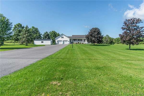 5.18 Acres of Land with Home for Sale in Dexter, New York