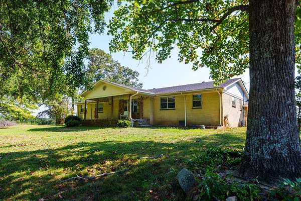 6.6 Acres of Land with Home for Sale in Winfield, Alabama