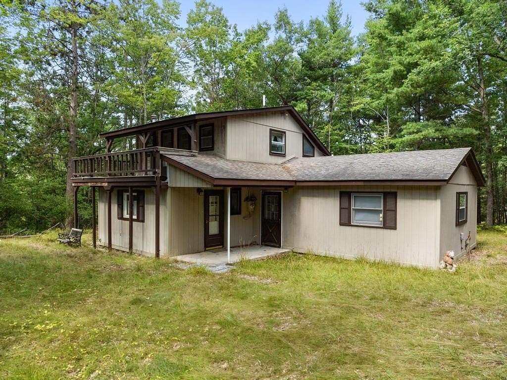 26 Acres of Recreational Land with Home for Sale in Indian River, Michigan