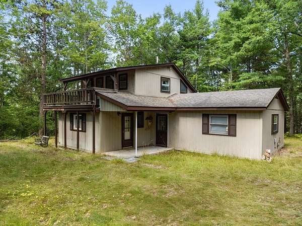 26 Acres of Recreational Land with Home for Sale in Indian River, Michigan