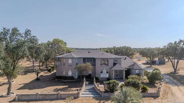 9.5 Acres of Land with Home for Sale in Von Ormy, Texas
