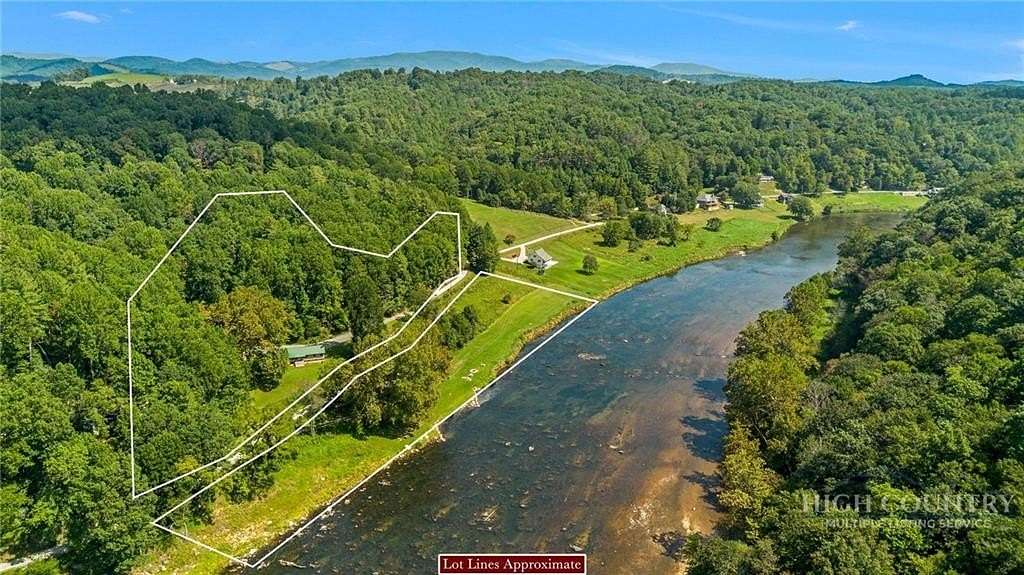 8.25 Acres of Land with Home for Sale in Grassy Creek, North Carolina